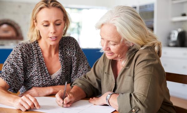 Two women reviewing a will