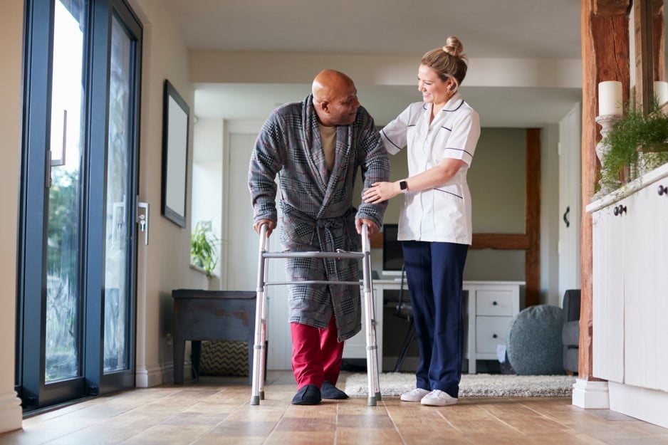 A man being cared for by a nurse