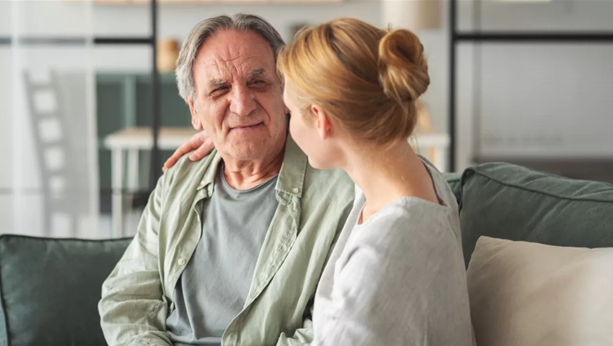 Senior man looking at his daughter.