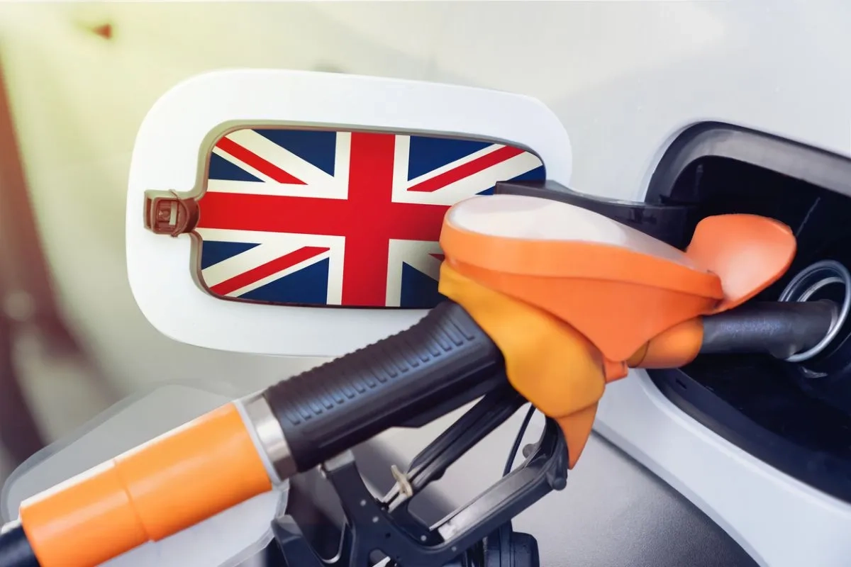 The flag of great Britain on the hatch of the gas tank of a car at a gas station