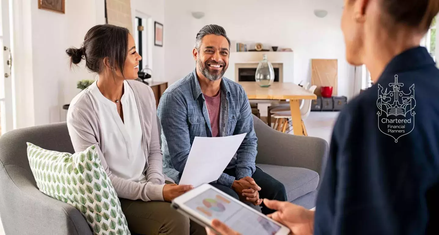 A couple talking to an adviser