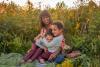 woman-smiling-at-her-twin-todler-boys
