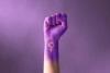 fist-of-a-purple hand raised