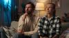 Thoughtful woman man Caucasian family married couple sat in the sofa thinking